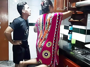 Diana Prince tries to sate her son with her cooch in the kitchen