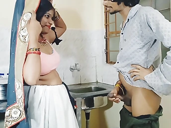 Desi Aunty gets escapist in the kitchen with a stepson's hard cock